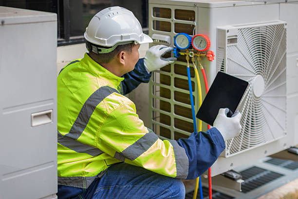 Professional Air Duct Cleaning technician working in Fairhope, AL